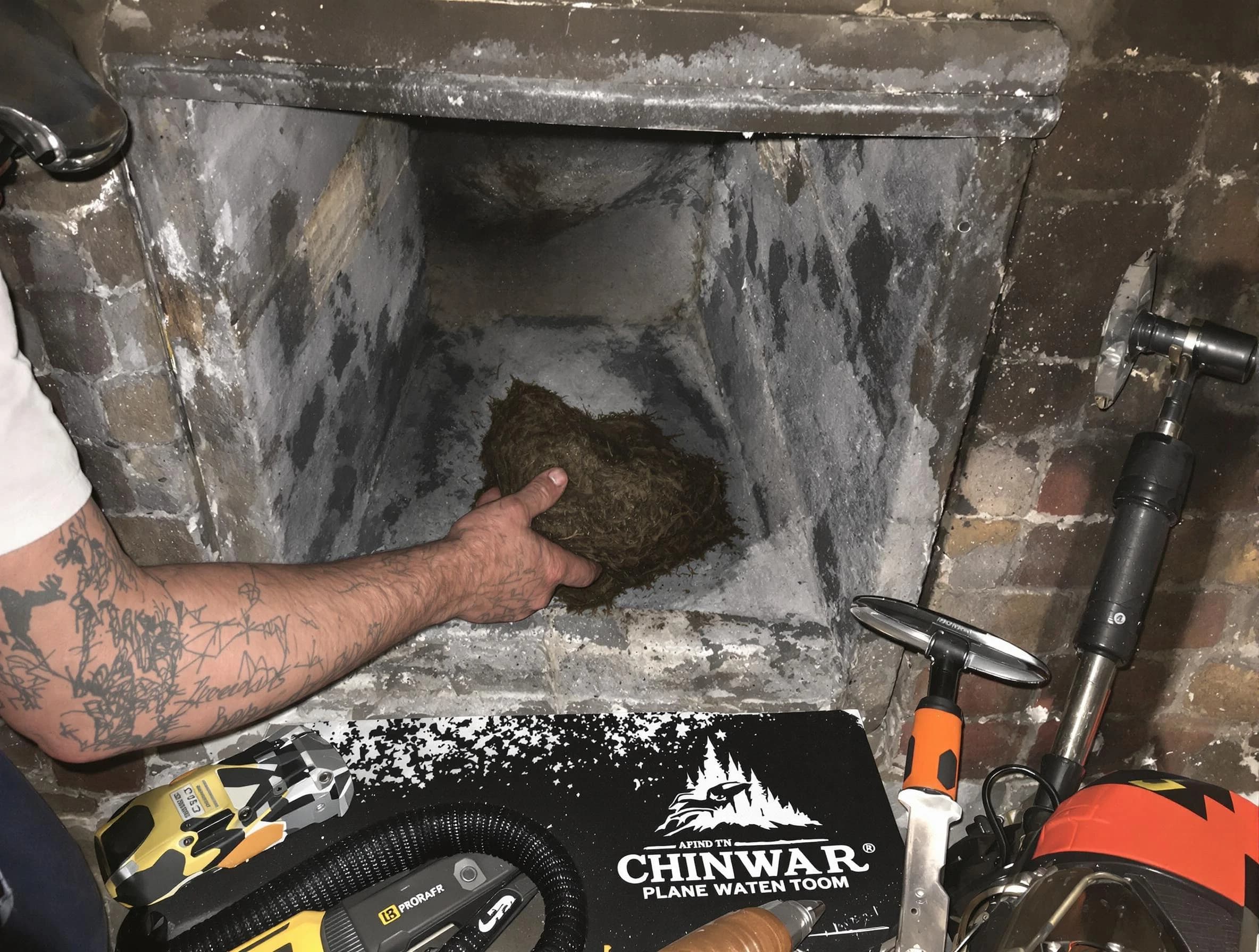 Lithia Springs Chimney Sweep safely removing debris and screening chimney in Lithia Springs, GA